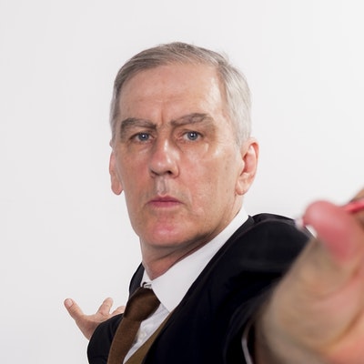 portrait photo of Robert Forster