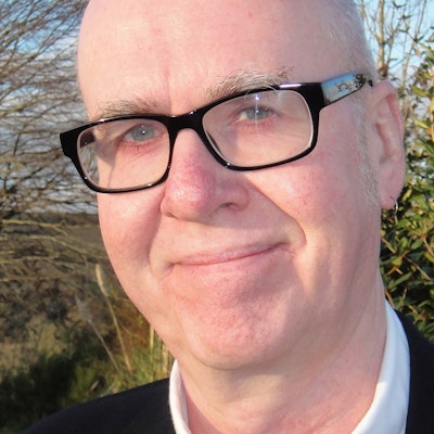 portrait photo of Adrian Tinniswood