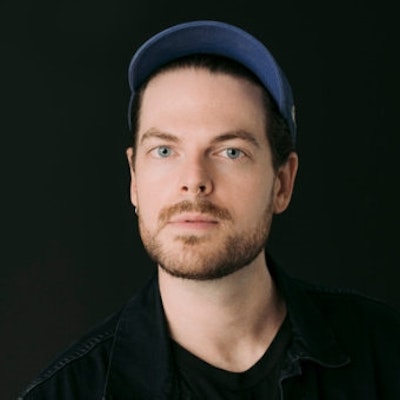 portrait photo of Adam J. Kurtz