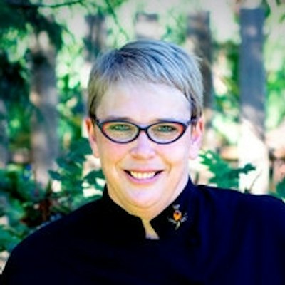portrait photo of Theresa Carle-Sanders