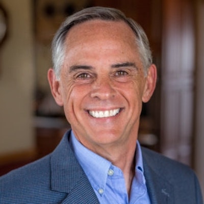 portrait photo of John G. Miller