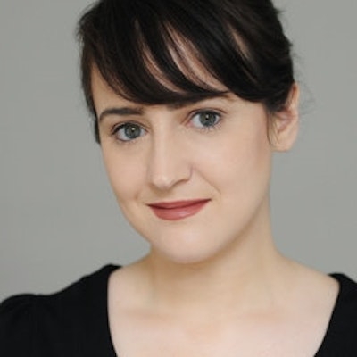 portrait photo of Mara Wilson