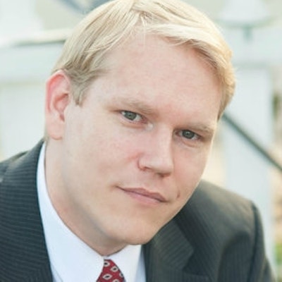 portrait photo of PETER B. DORAN
