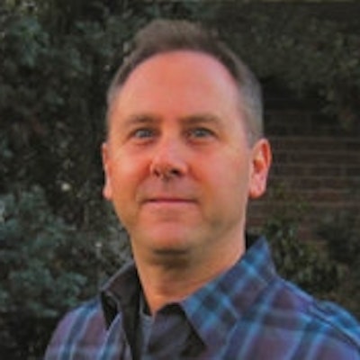 portrait photo of Christopher Eliopoulos