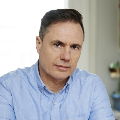 portrait photo of D. B. John