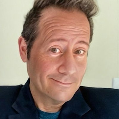 portrait photo of Russell Ginns