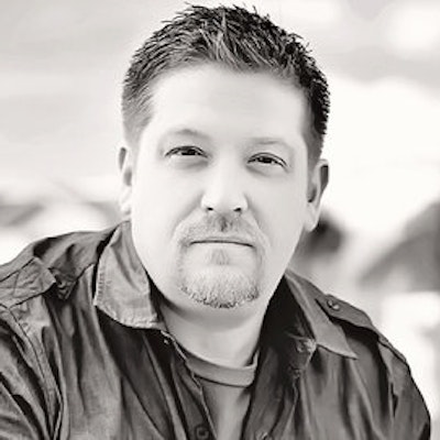 portrait photo of J. Todd Scott
