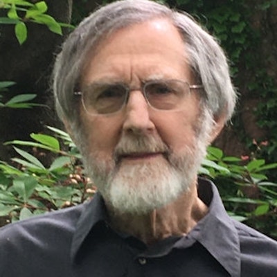 portrait photo of Carl Dennis