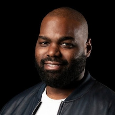 portrait photo of Michael Oher