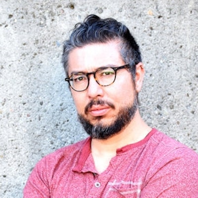 portrait photo of J. Michael Martinez