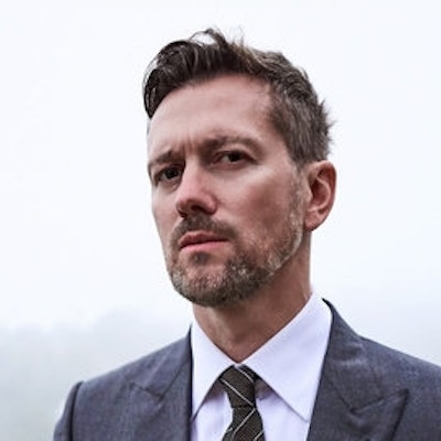 portrait photo of Kyle Newman