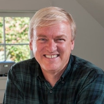 portrait photo of Chris Van Dusen