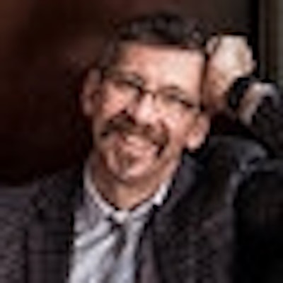 portrait photo of John O. Morisano