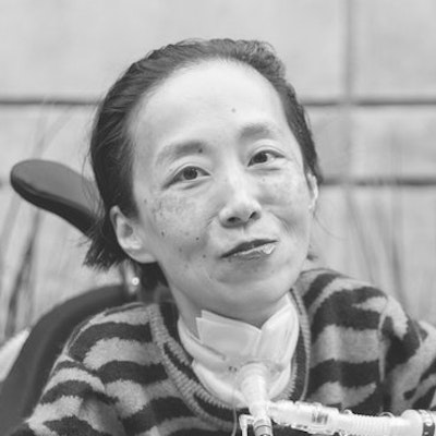 portrait photo of Alice Wong