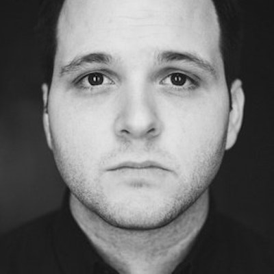 portrait photo of Derek DelGaudio