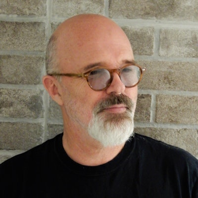 portrait photo of Stuart Everly-Wilson