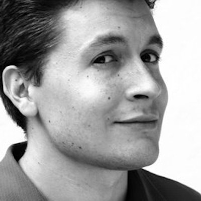 portrait photo of Adam Gustavson