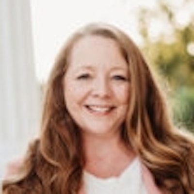 portrait photo of Tama Fortner