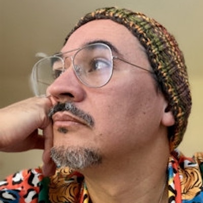 portrait photo of Tomás Q. Morín