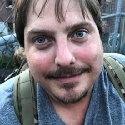 portrait photo of Daniel Genis