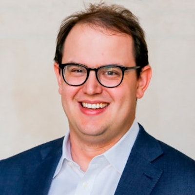 portrait photo of Ben Buchanan
