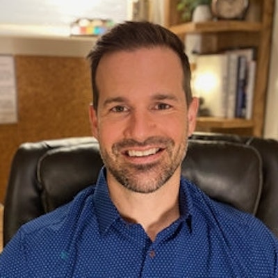 portrait photo of Justin Bourne