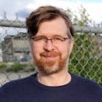 portrait photo of Michael Simpson