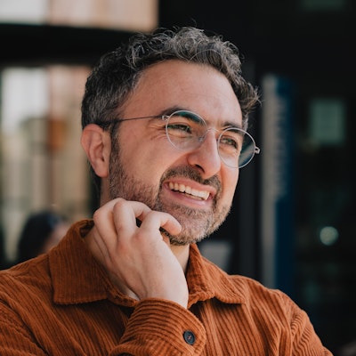 portrait photo of Mustafa Suleyman