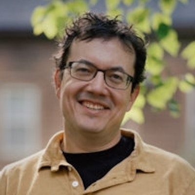 portrait photo of Andrew Leland