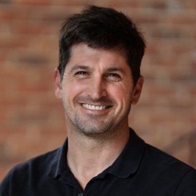 portrait photo of John Lovell