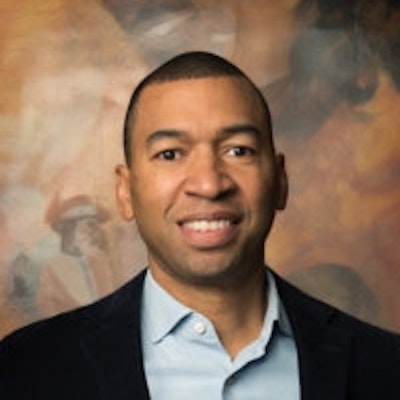 portrait photo of Steven L. Reed