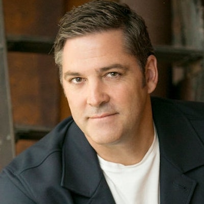 portrait photo of Ken Harrison