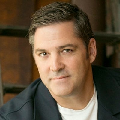 portrait photo of Ken Harrison