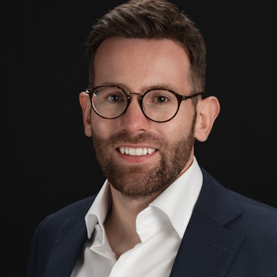 portrait photo of Thomas Curran