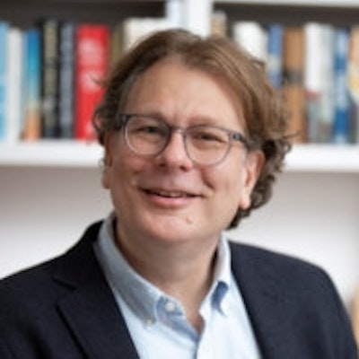 portrait photo of Adam Ratner