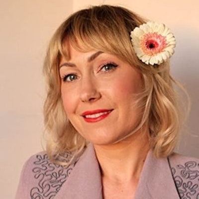 portrait photo of Brigette Barrager