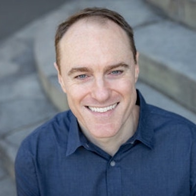 portrait photo of James Riley