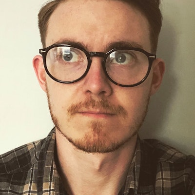 portrait photo of Aaron Cushley