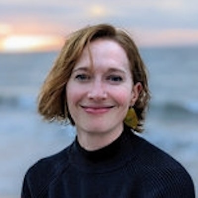 portrait photo of Katie Collom