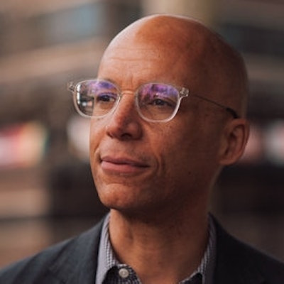 portrait photo of Simon Okotie