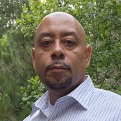 portrait photo of Raymond Santana