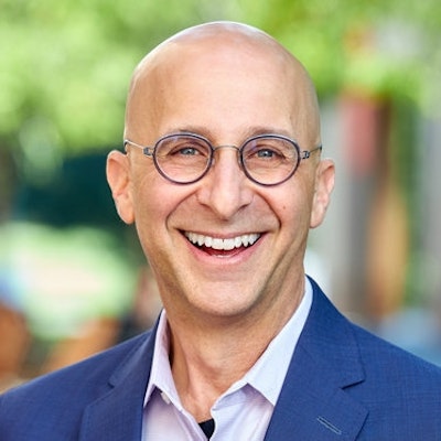 portrait photo of Robert E. Siegel