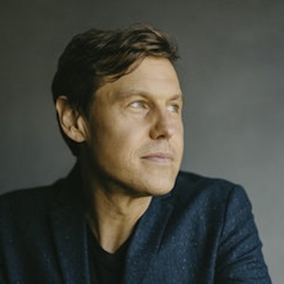 portrait photo of Jay Stringer