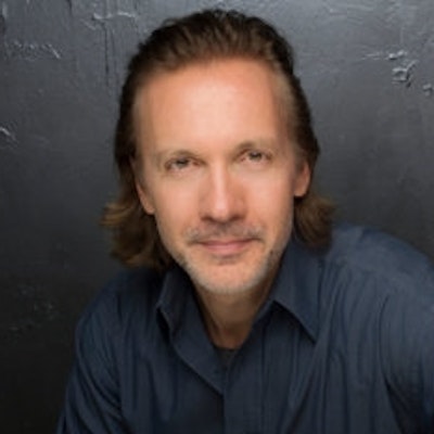 portrait photo of Michael Riley