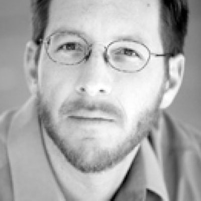 portrait photo of Andrew Carroll