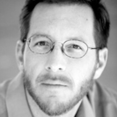 portrait photo of Andrew Carroll
