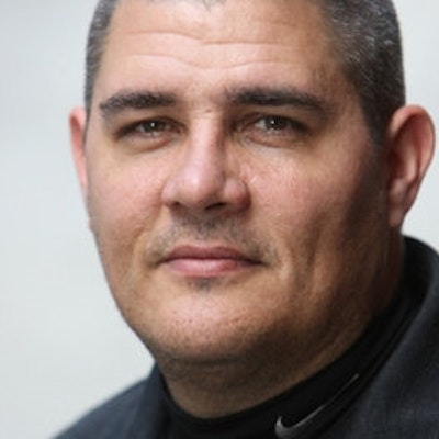 portrait photo of Adam Johnson