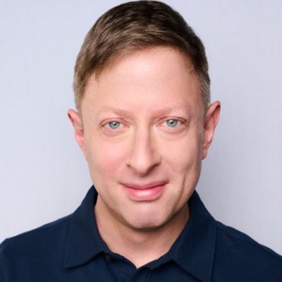 portrait photo of Daniel Altman