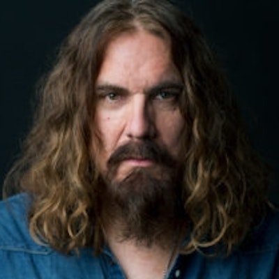 portrait photo of Tom Wilson