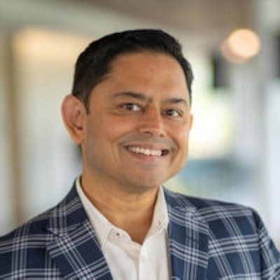portrait photo of Arindrajit Dube